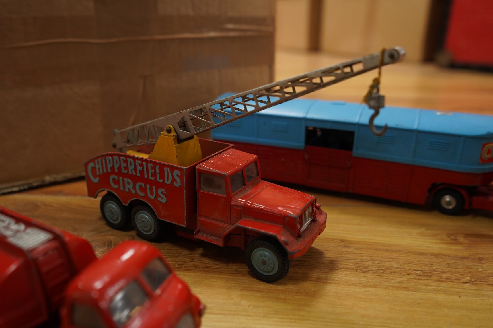 A collection of forty Corgi Toys and fourteen Matchbox Series diecast vehicles, including; The Man From Uncle Oldsmobile, a James Bond Aston Martin DB5 in gold, a Commer 5-ton truck with trailer and a selection of loads,